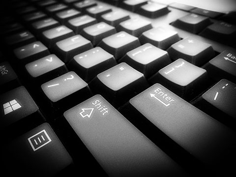 Screenshot of black keyboard with white letters.